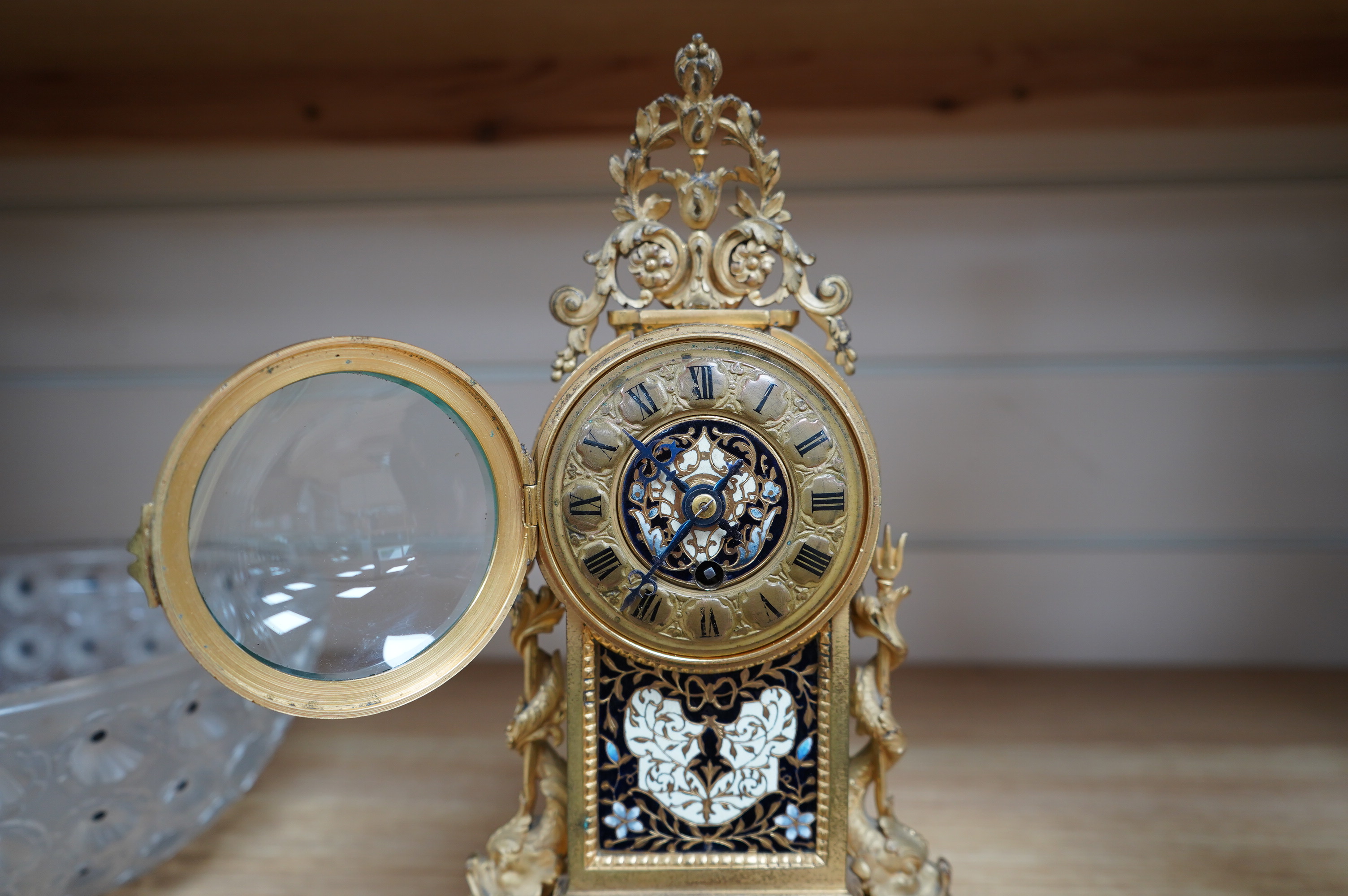 A French champleve mantle timepiece, with balance escapement, 27cm high. Condition - fair to good.